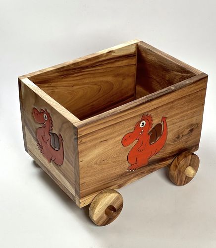 Spielzeugkiste aus Holz mit Rädern, Drache rot